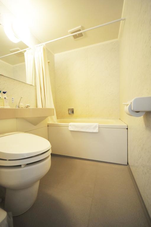 Beppu Station Hotel Rum bild