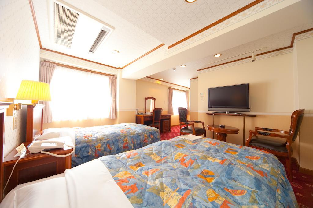 Beppu Station Hotel Rum bild